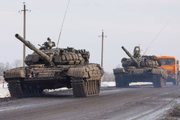 Militares russos são vistos perto da vila de Oktyabrsky, região de Belgorod, perto da fronteira russo-ucraniana. No início de 24 de fevereiro, o presidente da Rússia, Putin, anunciou sua decisão de lançar uma operação militar especial depois de considerar os pedidos dos líderes da República Popular de Donetsk e da República Popular de Lugansk