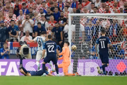 LUSAIL CITY, QATAR - DECEMBER 13: Julian Alvarez of Argentina scores the team's second goal past Dominik Livakovic of Croatia during the FIFA World Cup Qatar 2022 semi final match between Argentina and Croatia at Lusail Stadium on December 13, 2022 in Lusail City, Qatar. (Photo by Shaun Botterill - FIFA/FIFA via Getty Images)