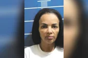 Imagem da ex-deputada ao ser fichada na prisão