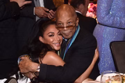 A cantora Nicole Scherzinger e Quincy Jones 