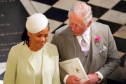 Charles conversa com a mãe de Meghan, Doria Ragland