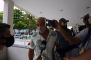 Belo chegando à delegacia