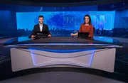 Matheus Ribeiro, de Goiás, e Larissa Pereira, da Paraíba, na bancada do JN