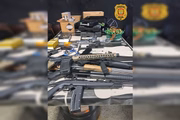 Armas apreendidas com dono de loja, no dia em que ele foi preso