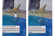 Garotinha parece testar a temperatura da água antes de entrar