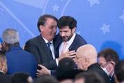 Ele sobreviveu a acusações de que patrocinara candidaturas laranjas nas eleições de 2018, a um indiciamento da Polícia Federal e à denúncia do Ministério Público de Minas Gerais por envolvimento no esquema