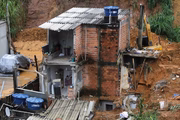 Casa que desabou após as fortes chuvas na cidade