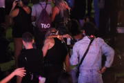 Os atores José Loreto e Duda Santos curtiram o último dia de Rock In Rio aos beijos
