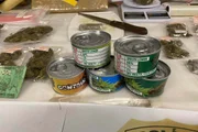 Parte da maconha apreendida estava acondicionada em latas 