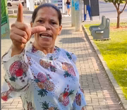 Religiosa comemorou redução do preço da gasolina no governo Lula fazendo o "L"