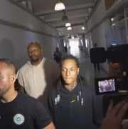 Oruam chegando na delegacia