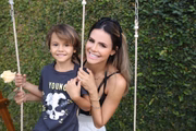 O menino participou do ensaio fotográfico da mãe