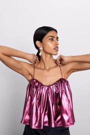 Top com efeito metalizado, da Zara (R$ 189)