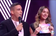 Ela ficou famosa depois de ser assistente de André Marque no The Voice Kids