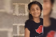 A menina Karen Cristina Godoi de Oliveira, de 13 anos