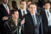 Jair Bolsonaro ao lado de Mauro Cid
