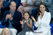 A família Cambridge aplaude os atletas 