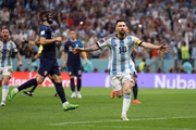 LUSAIL CITY, QATAR - DECEMBER 13: Lionel Messi of Argentina celebrates after scoring the team's first goal during the FIFA World Cup Qatar 2022 semi final match between Argentina and Croatia at Lusail Stadium on December 13, 2022 in Lusail City, Qatar. (Photo by Richard Heathcote/Getty Images)