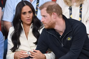 A atriz norte-americana Meghan Markle ao lado do marido, o príncipe Harry, da família real britânica