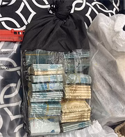 Dinheiro em espécie foi encontrado em sacos de grifes e em uma mala